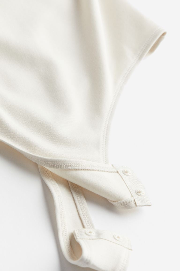 Asymmetric Thong Bodysuit